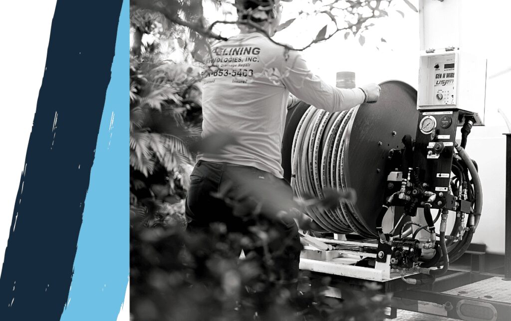 Hydro Jetting machine and technician using on a home sewer system to clean it.
